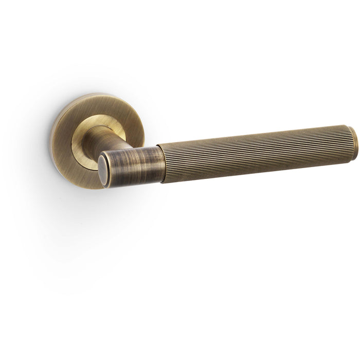 SOLID BRASS Reeded Door Handle Set - Antique Brass Straight Lever On Round Rose