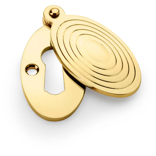 Oval Standard Lock Profile Escutcheon Ringed Swing Cover - Unlaquered Brass