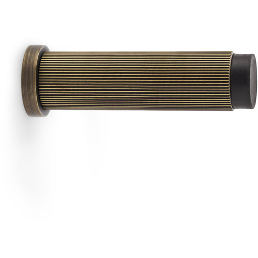 Rubber Tip Reeded Wall Mounted Doorstop - Antique Brass 75mm Cylinder Lined Door