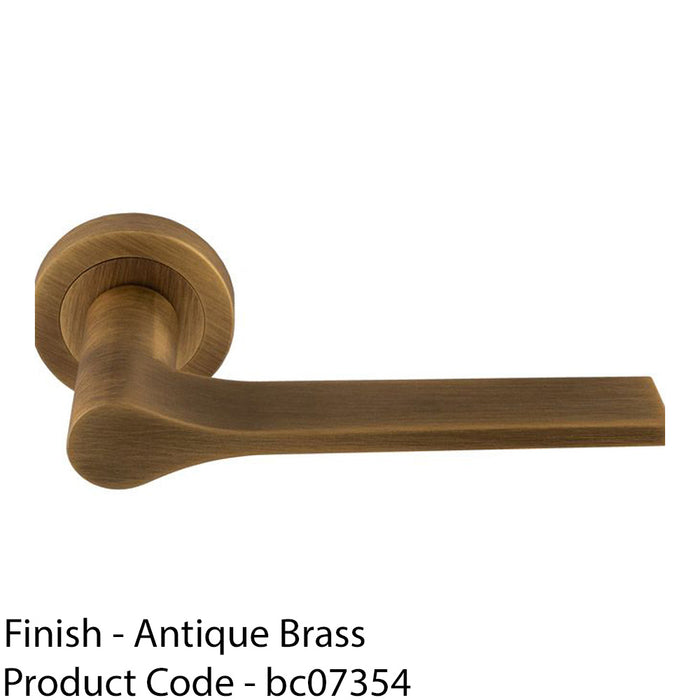 Contemporary Flat Door Handle Set - Antique Brass Sleek Lever On Round Rose 1