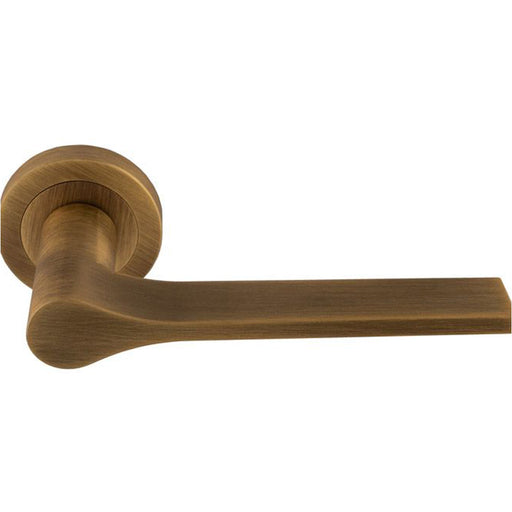 Contemporary Flat Door Handle Set - Antique Brass Sleek Lever On Round Rose