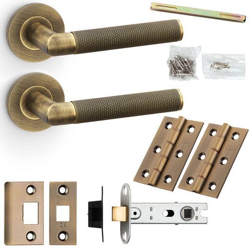 Door Handle & Latch Pack - Antique Brass - Mitred Knurled Bar Lever Round Rose