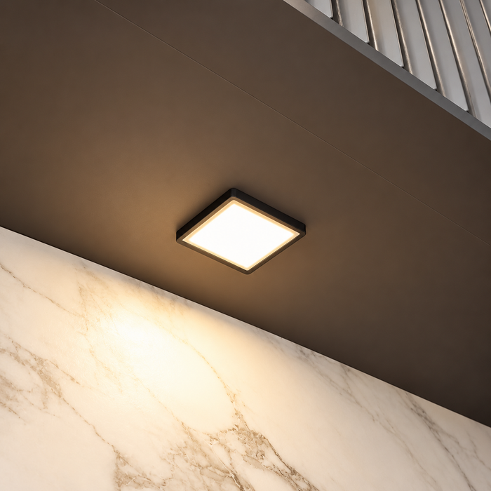 Black Low Profile Square Surface Mounted LED Under Cabinet Light installed beneath kitchen cabinets