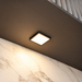 Black Low Profile Square Surface Mounted LED Under Cabinet Light installed beneath kitchen cabinets