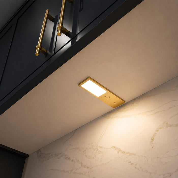Brass 175mm Super Slim Rectangle Surface Mounted LED Under Cabinet Light installed beneath kitchen cabinets