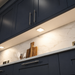 Aluminium Low Profile Square Surface Mounted LED Under Cabinet Light installed beneath kitchen cabinets