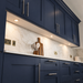 Aluminium Super Slim Round Surface Mounted LED Under Cabinet Light installed beneath kitchen cabinets