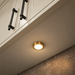 Brass Round Surface Mounted LED Under Cabinet Light installed beneath kitchen cabinets