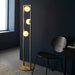 1410mm Brushed Gold Geometric 3 Light Floor Lamp & Glass Opal Sphere Shades